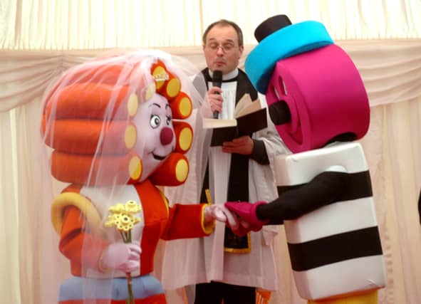 Bertie and Betty Bassett tie the knot at the Bassett's factory in 2009.