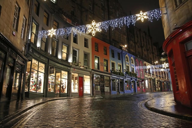 Victoria Street is still lit up on Hogmanay. Photo credit:  Andrew Milligan/PA Wire