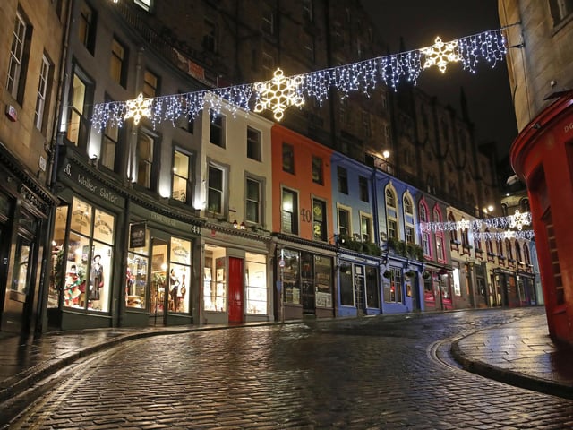Victoria Street is still lit up on Hogmanay. Photo credit: Andrew Milligan/PA Wire