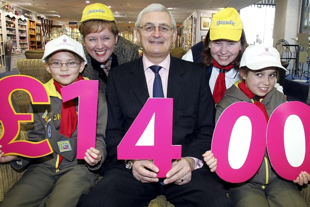 2nd Staveley Brownies received money from the Co-op to buy new uniforms back in 2006. Brownie Megan Hughes (9), Cyrrhian Macrae (back left), Head of Community & Co-operative Affairs at Midlands Co-op, David Pearce, Manager of Midlands Co-op’s Chesterfield department store, Brown Owl, Lisa Smith, and Brownie Georgia Douglas (9).