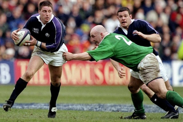 Kelso-born Alan Tait, 56, was capped 27 times by Scotland between 1987 and 1999, also turning out twice for the British and Irish Lions in 1997. Also a rugby league player, his clubs included Kelso and Newcastle Falcons. Here he's pictured in action during 1999's Five Nations match against Ireland at Murrayfield. (Photo: Jamie McDonald/Allsport)