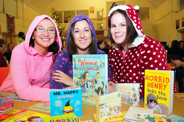 St. Aidans Primary school staff (left to right) Gillian Hood, Marie Crowe and Kirsty Lightowler with a selection of books for sale and Roald Dahl was among the popular choices.