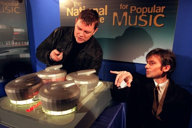 Nick Banks and Russell Senior of Pulp look at a scale model of the centre in 1996.