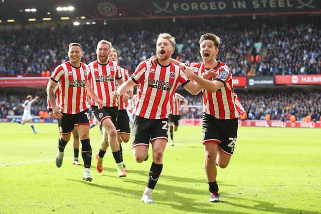 James McAtee (right) and Tommy Doyle following the latter's goal for Sheffield United in the FA Cup quarter-finals