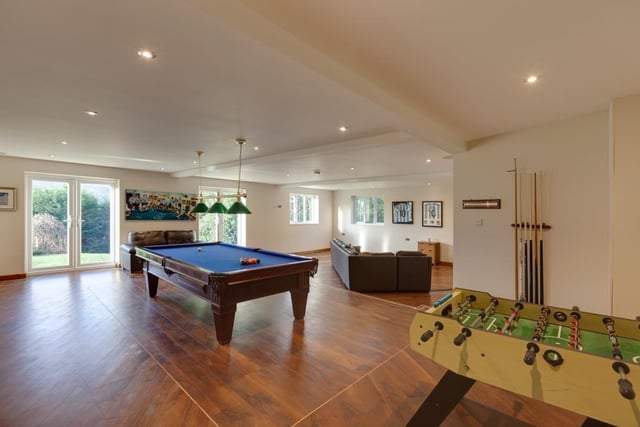 Located just through from the sitting room, this games room is another terrific entertainment space, either for hosting or just for the family.