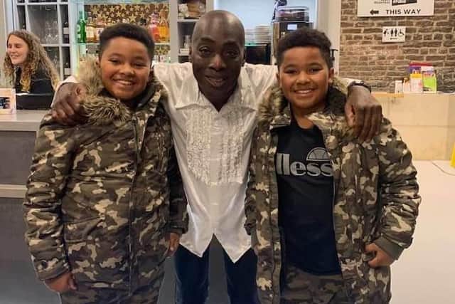 Vernon with his twin sons Harvey and Taylor, both 11.