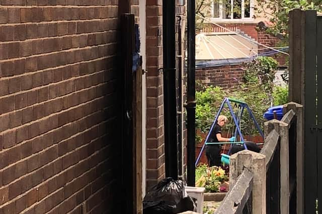 The garden of a house on Edgedale Road, Nether Edge, has been searched by police officers today