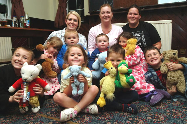 The Masons Arms Pub in Hucknall held a pyjama party for Children In Need. Pictured are staff with their children in 2007.