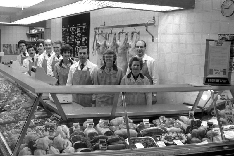 Staff behind the counter at butcher and delicatessen Crombie and Son, Broughton Road Edinburgh, November 1984.