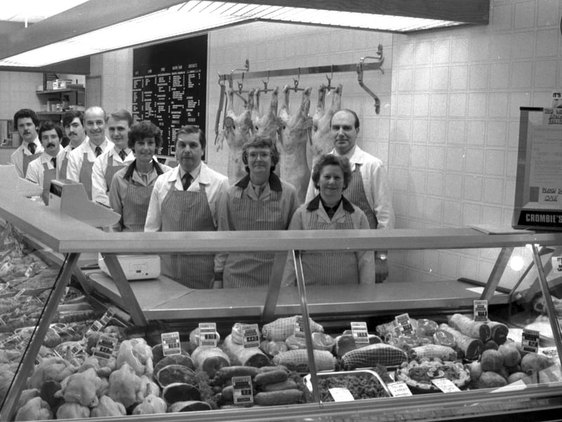 Staff behind the counter at butcher and delicatessen Crombie and Son, Broughton Road Edinburgh, November 1984.