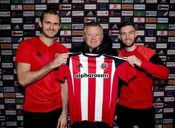 James Hanson and Jay O'Shea with manager Chris Wilder on the day they signed for Sheffield United: Simon Bellis/Sportimage
