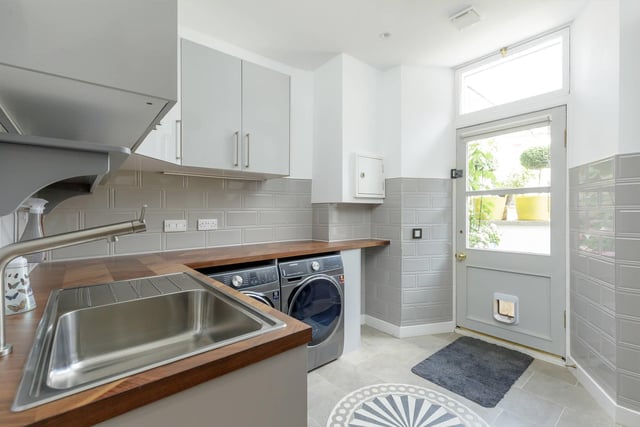 The utility room has a laundry chute, which is connected to the top floor. It makes doing the washing much easier and more convenient.