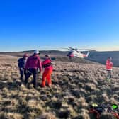 A man has died after falling from height during a bike ride with friends at Bradfield Moors. PIctued is the coastguard helicopter, and mountain rescue teams. PIcture: Woodhead Mountain Rescue