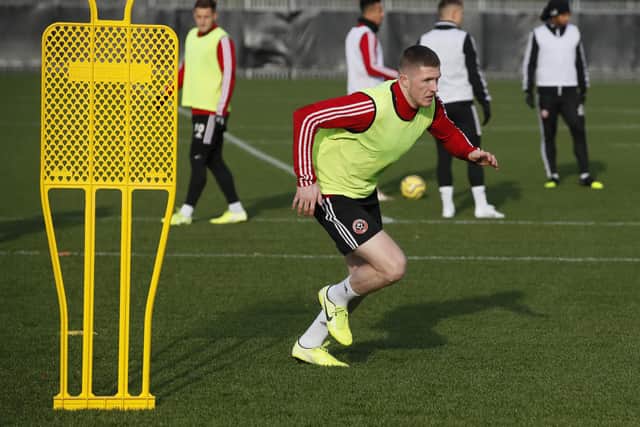 John Lundstram, the Sheffield United midfielder, is now being put through his paces at home: Simon Bellis/Sportimage