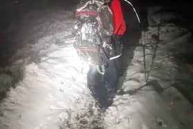 The walkers had to be led to safety after losing their bearings in the snow (pic: Buxton Mountain Rescue Team)