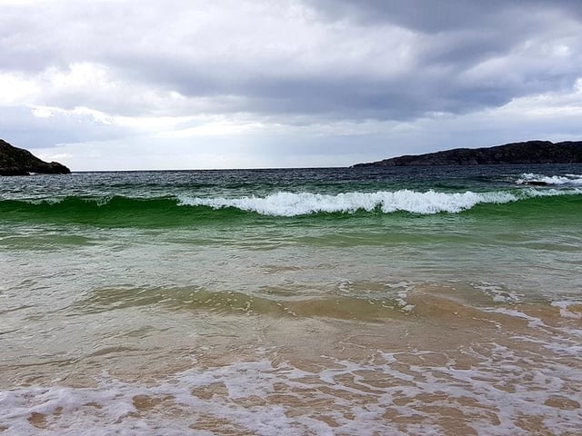 This picture of a wave on Achmelvich Beach, in the north-west of Scotland, was taken by Graham Brewer.