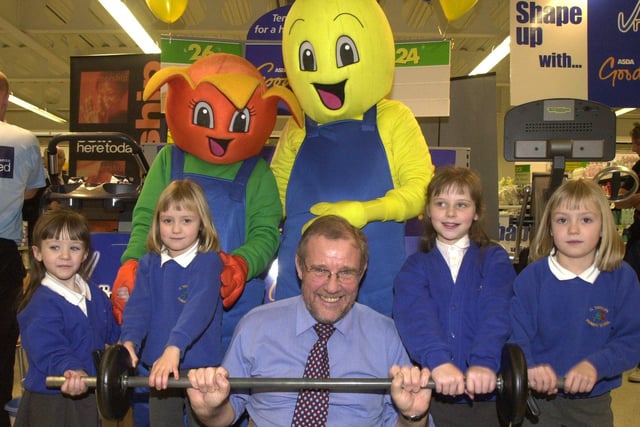 Pictured at the  Asda supermarket, Handsworth, Sheffield, where MP Richard Caborn was at the store to start a charity 24 hour bikathon in 2004 pictured with  pupils from St Theresas RC Primary school, Amy Connelly 10, Bethany Connelly 5, and twins Annie and Molly Thorp 6, along with  Asda's Garden Gang's Orange and Melon.