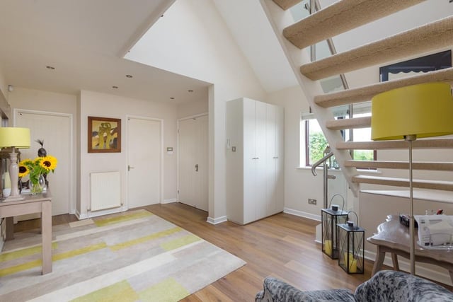 Upon entry to the property you will find yourself in this bright entrance hall. From here you can access every room in the home, including two downstairs bedrooms, the open-plan kitchen/living space and the lounge.