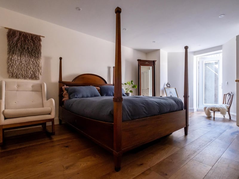 Large bedroom with fitted wardrobes
