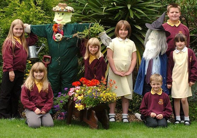 Pupils from Ridgeway Primary School who have made scarecrows for their Village in Bloom competition. They are, left to right, Holly Rhodes, 9, Beth Rhodes, 7, Sarah Barker, 10, Charlotte Dawson, 7, Toby Leverett, 7, Hope Leverett, 6 and Josh Dawson, 11, July 8, 2005