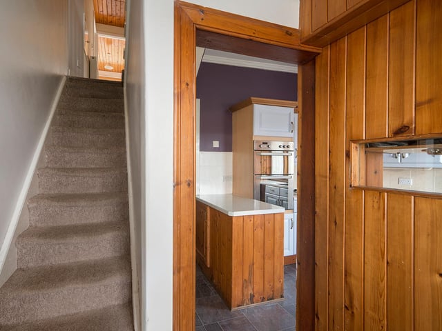 The house has a sitting room, kitchen, family bathroom and boot room on the ground floor, with three bedrooms and a shower room upstairs