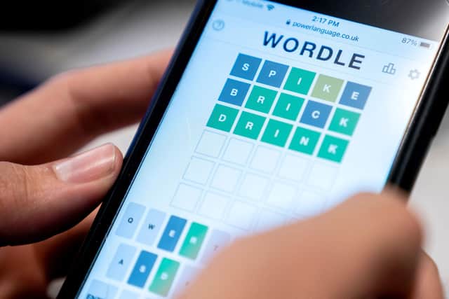 BeReal is similar to smash hit wordgame 'Wordle', in the sense that users can only post once per day and must return on a daily basis to participate. (Photo by STEFANI REYNOLDS/AFP via Getty Images)