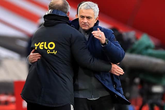 Tottenham Hotspur manager Jose Mourinho (right) and Sheffield United manager Chris Wilder embrace after the Premier League match at Bramall Lane, Sheffield. Mike Egerton/PA Wire.