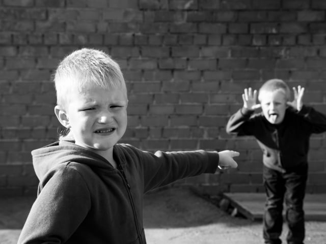 Also clype, klipe, claip. To tell tales about, inform against someone. "Tae clipe is tae tell tales. Nae one likes a clipe."