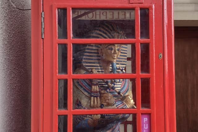 Tut-ally amazing: King Tut sarcophagus replica in the phone box 'mini museum'