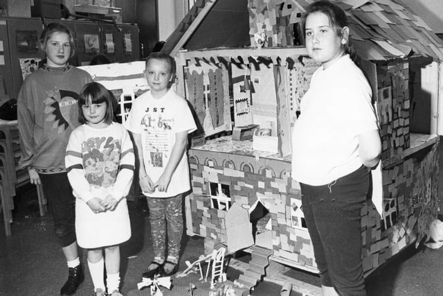 Building a giant dolls' house at the town's museum in 1991 were, left to right:  Jacqueline Newman, Jill Tubbritt, Tracy Rossiter and Helen Newman.