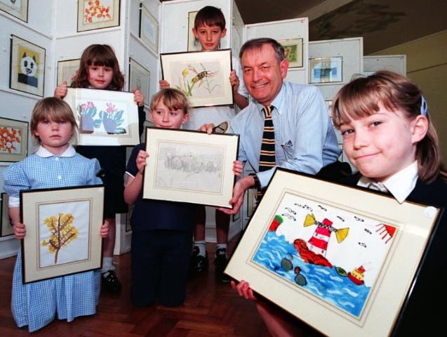 Barnburgh School had an art exhibition in 1997. Chairman of the Governers David Hughs here with children.