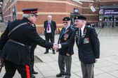 Deputy Lord Lieutenant Christopher Jewitt DL is greeted by members of Frecheville British Legion