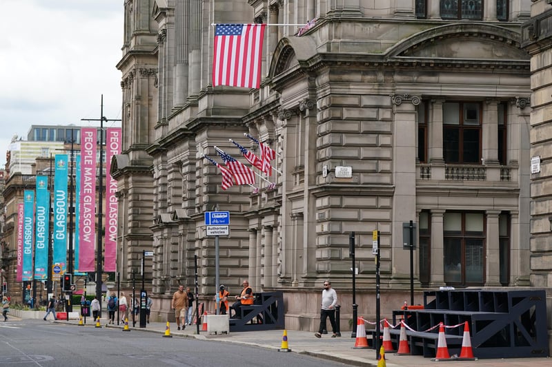 The American flag hangs from the City Chambers in Glasgow city centre ahead of filming