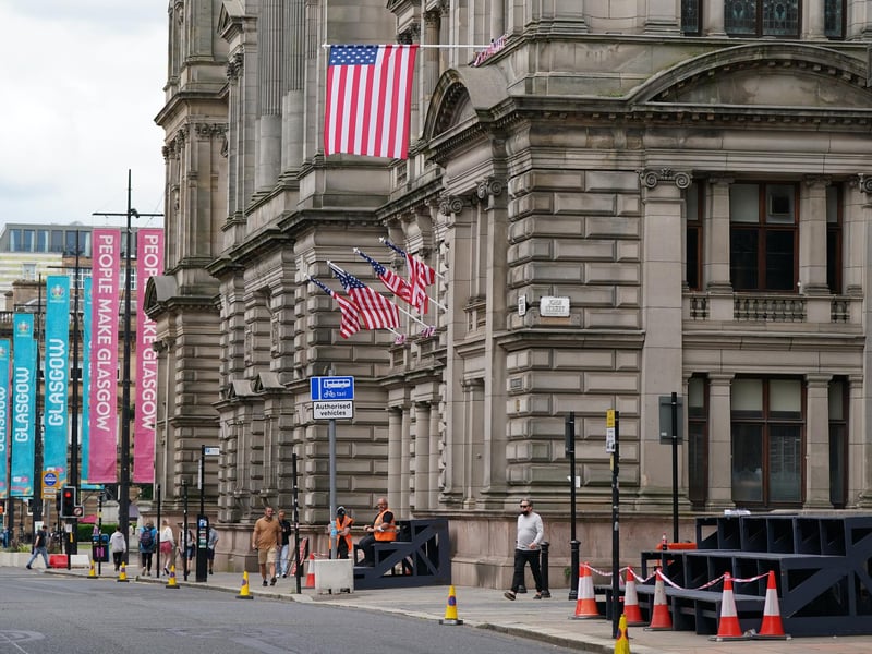 The American flag hangs from the City Chambers in Glasgow city centre ahead of filming