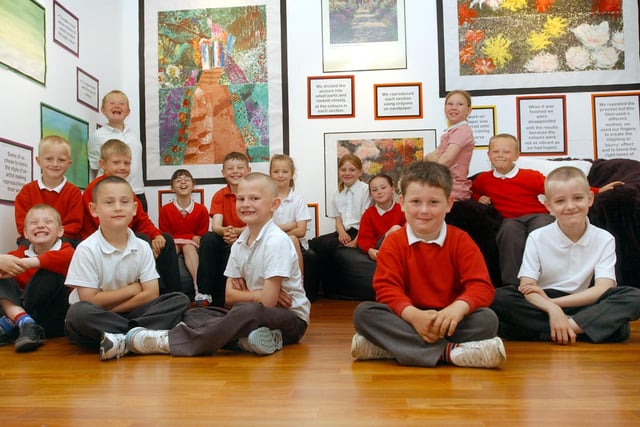 These pupils look delighted to be in the school's art gallery in 2006. Can you spot anyone you know?