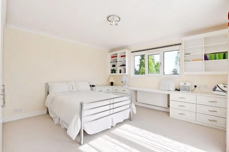 There are four further double bedrooms all with fitted furniture, one of which has access to the front terrace via a tilt and slide patio door.