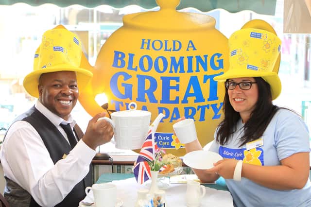 Neville Brown of the Hydro Cafe and Rachael Voss of Marie Curie were looking forward to the Blooming Great Tea Party in 2012