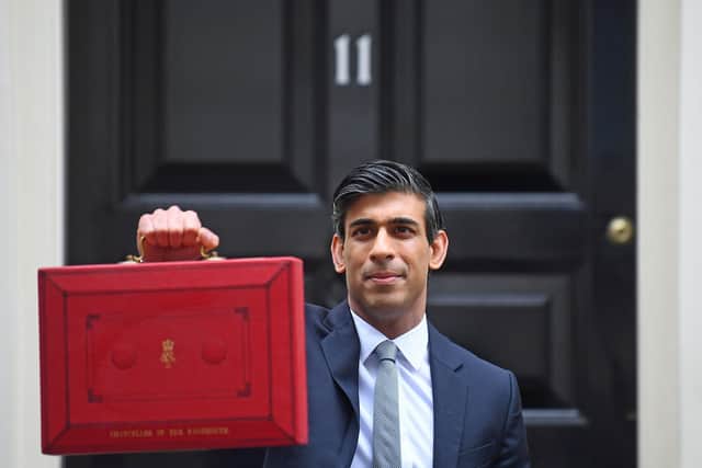 Chancellor of the Exchequer, Rishi Sunak, holds his ministerial 'Red Box' outside 11 Downing Street, London, before heading to the House of Commons to deliver his Budget. Photo: Victoria Jones/PA Wire