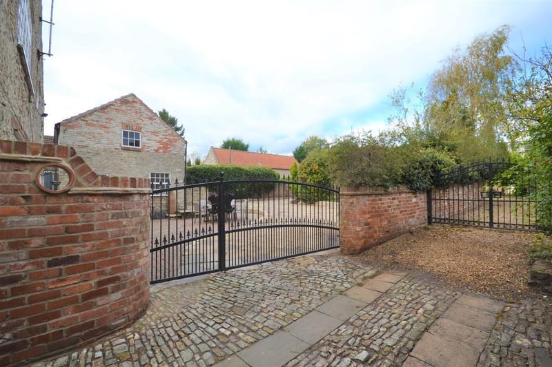 To the front of the property are two parking bays providing parking with gated access to the side providing shared driveway access to the rear garden.