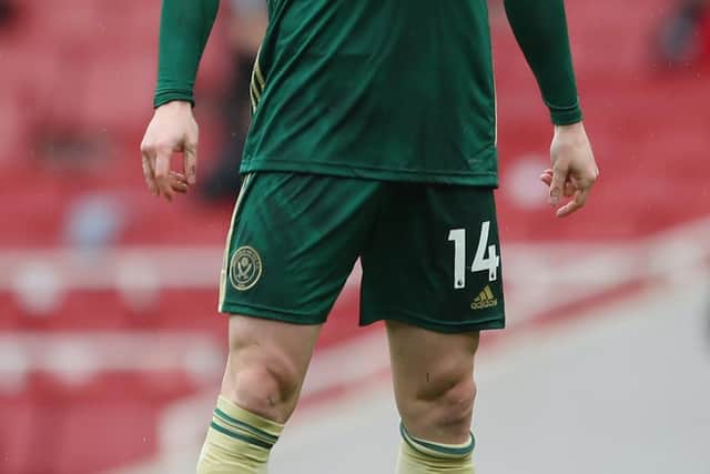 Oliver Burke wearing Sheffield United's green third strip, which they could model again at Liverpool: Simon Bellis/Sportimage