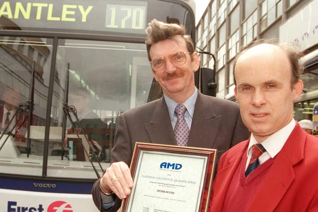 In 1999 First Mainline bus driver Peter Fettis received his certificate from the company's Doncaster Director and General Manager John Swann.