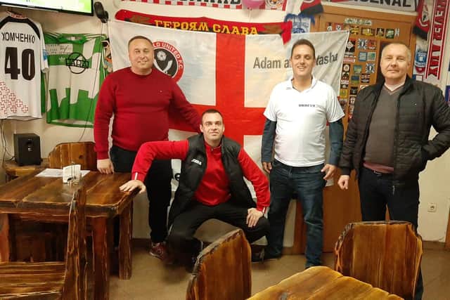 Adam Pate (second right)  is spreading the message about Sheffield United in Ukraine