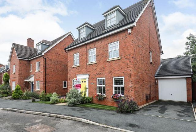 This five bedroom house has a kitchen extended to an open plan family dining room with two sets of bifold doors opening onto the south facing garden. Marketed by William H Brown, 01909 776001.