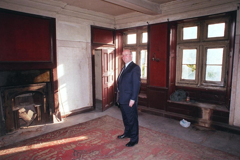 The 8 bedroomed house built in 1712 has no electricity and has the old gas lamps intact and was up for sale at £200,000 in 1999. Estate agent James Mee in the master bedroom.