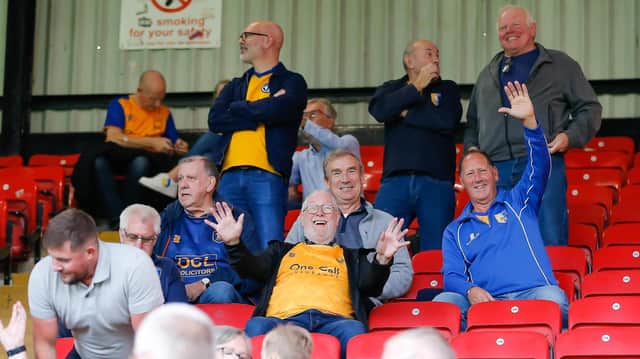 Mansfield fans at the Breyer Group Stadium for the match against Leyton Orient.