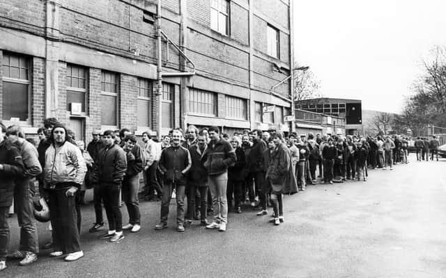 Fans queue for tickets for the fourth round FA cup match at the Sheffield Wednesday football ground.... January 1984