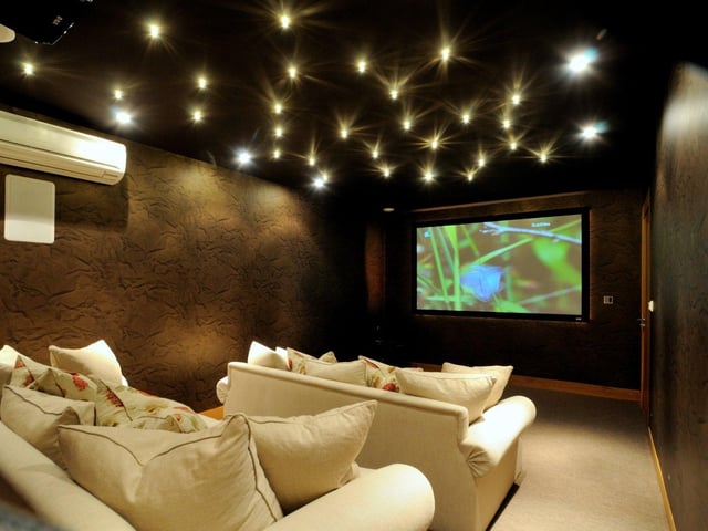 The floor of leisure facilities also includes a cosy home cinema room, where guests can escape for some entertainment.