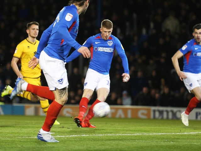 Andy Cannon slots home to open the scoring in the fourth minute