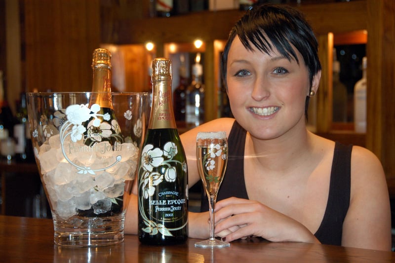 Anna Robinson with a French 75 Champagne cocktail at Bud Bigalows in 2010. Does this bring back wonderful memories?