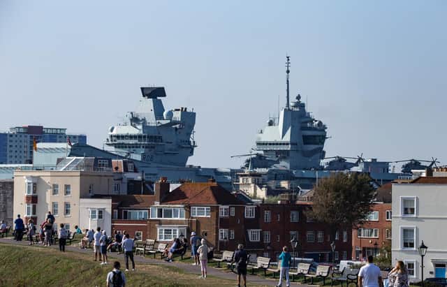 A regular sight in our newspaper and on our website - HMS Queen Elizabeth. Here she is as she left Portsmouth earlier this month. Picture: Tony Hicks